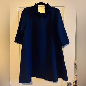 Navy mini dress with mid length sleeves and tie at the back